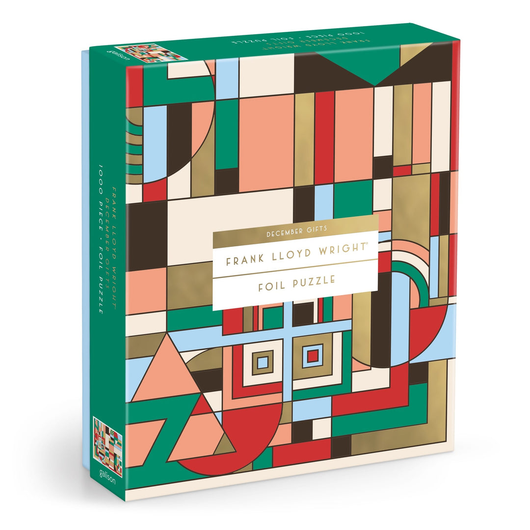 The Frank Lloyd Wright Foundation’s December Gifts 1000 Piece Foil Puzzle features colorful geometric patterns in green, red, gold, black, and white, inspired by Frank Lloyd Wright’s architectural style.
