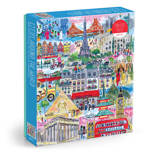 The Michael Storrings Cities Around the World 1000 Piece Puzzle by Michael Storrings features illustrated landmarks like the Eiffel Tower, Big Ben, and the Colosseum, with “1000 Piece Puzzle” shown in a bold red circle on the box.