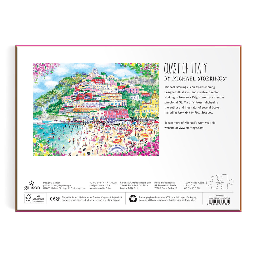 The back of the Michael Storrings Coast of Italy 1000 Piece Puzzle box by Michael Storrings features colorful seaside town art with bright buildings and a lively beach, plus artist info—making it a perfect gift for art lovers.