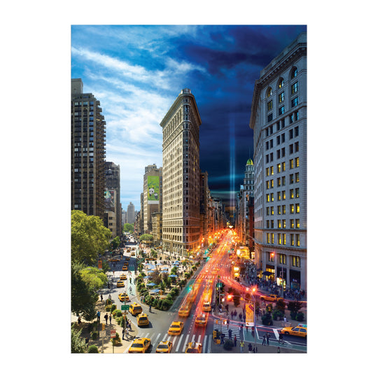 Experience New York’s transformation with the Stephen Wilkes Day To Night Flatiron 1000 Piece Puzzle, featuring the iconic Flatiron Building transitioning from day to night under a breathtaking sky, captured by Stephen Wilkes.
