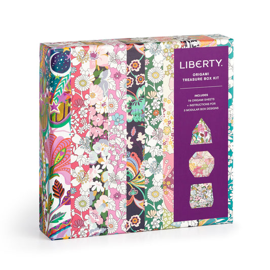 The Liberty of London Ltd Liberty Origami Treasure Box Kit features colorful Liberty patterns on the packaging, a purple panel with three origami box designs, and front details listing kit contents.