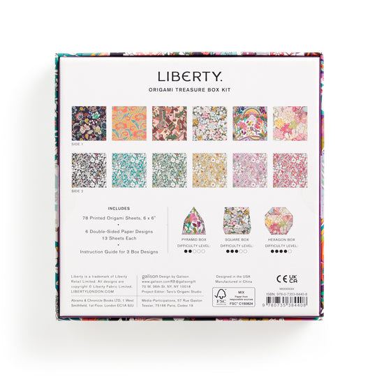 Back of a Liberty Origami Treasure Box Kit by Liberty of London Ltd, showing 12 double-sided Liberty patterns, three sample box designs, and a list with 78 sheets, instructions, and various skill levels.