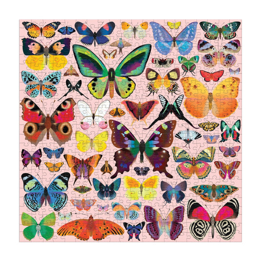 The Brilliant Butterflies 500 Piece Puzzle by Natasha Durley showcases vibrant butterfly species arranged in rows on a light pink background, resembling a colorful Butterfly Identifier Field Guide.