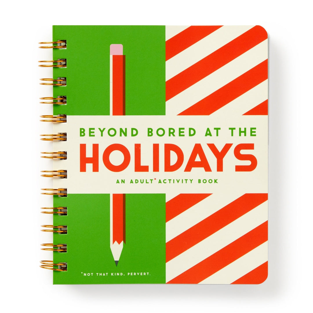 Brass Monkey’s spiral-bound book, Beyond Bored At The Holidays, features festive brain games with red, white, and green designs, a green pencil graphic, and the cheeky tagline “Not that kind. Pervert.”.