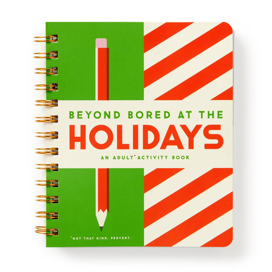 Brass Monkey’s spiral-bound book, Beyond Bored At The Holidays, features festive brain games with red, white, and green designs, a green pencil graphic, and the cheeky tagline “Not that kind. Pervert.”.
