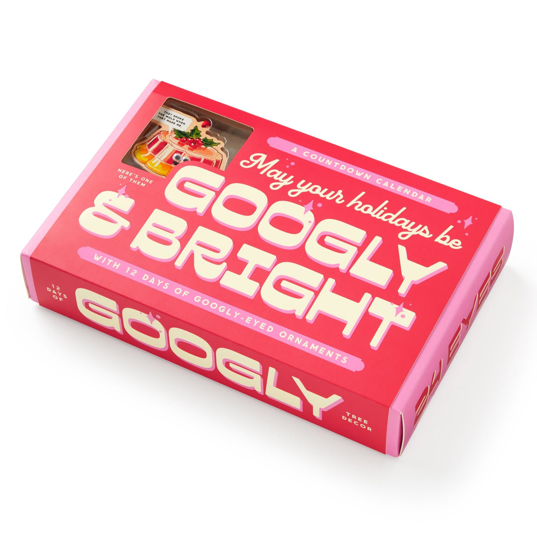 The Brass Monkey Googly & Bright Holiday Ornament Countdown Calendar features a festive box with “GOOGLY” in bold, a window showing a googly-eyed ornament, and is perfect for fans of quirky holiday decor.