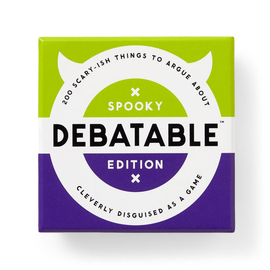 The Brass Monkey Debatable Spooky Edition is a green and purple game box with 200 scary-ish things to argue about—perfect as a spooky debate game for your next Halloween party.