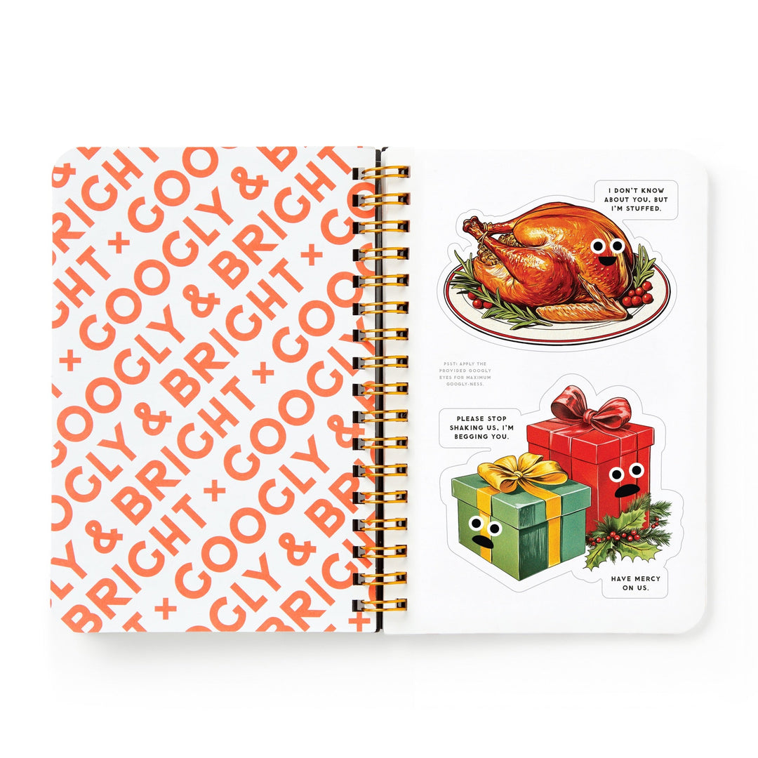 An open Googly & Bright Holiday Sticker Book by Brass Monkey displays GOOGLY & BRIGHT in orange with a page of oversized holiday stickers—like a roast turkey and gift boxes with googly eyes and festive captions.