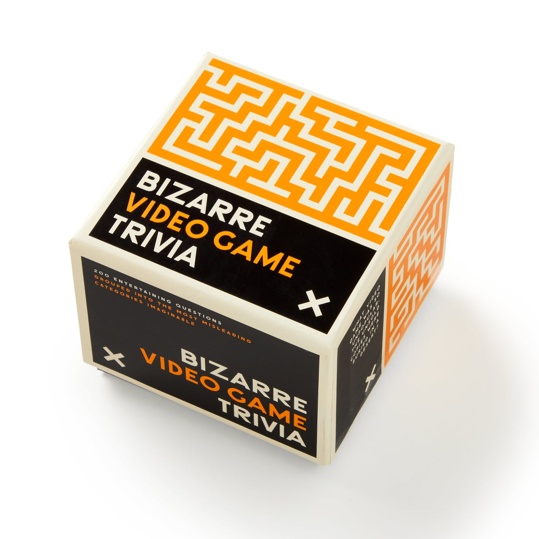 A cube-shaped box labeled Bizarre Video Game Trivia by Brass Monkey, featuring bold white and orange text on a black background with an orange maze graphic—ideal for fans of quirky video game facts.