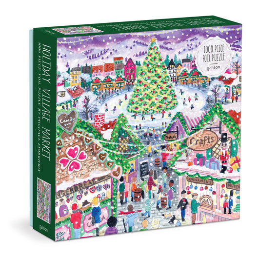 The Michael Storrings Holiday Village Market 1000pc Foil Puzzle in Square Box by Michael Storrings features a festive holiday market scene with decorated stalls, shoppers, a central Christmas tree, and snow-covered buildings.