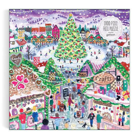 Illustration of a festive holiday market with colorful stalls, decorated tree, lights, shoppers, and snowy buildings; "Michael Storrings Holiday Village Market 1000pc Foil Puzzle in Square Box" by Michael Storrings is written in the corner.