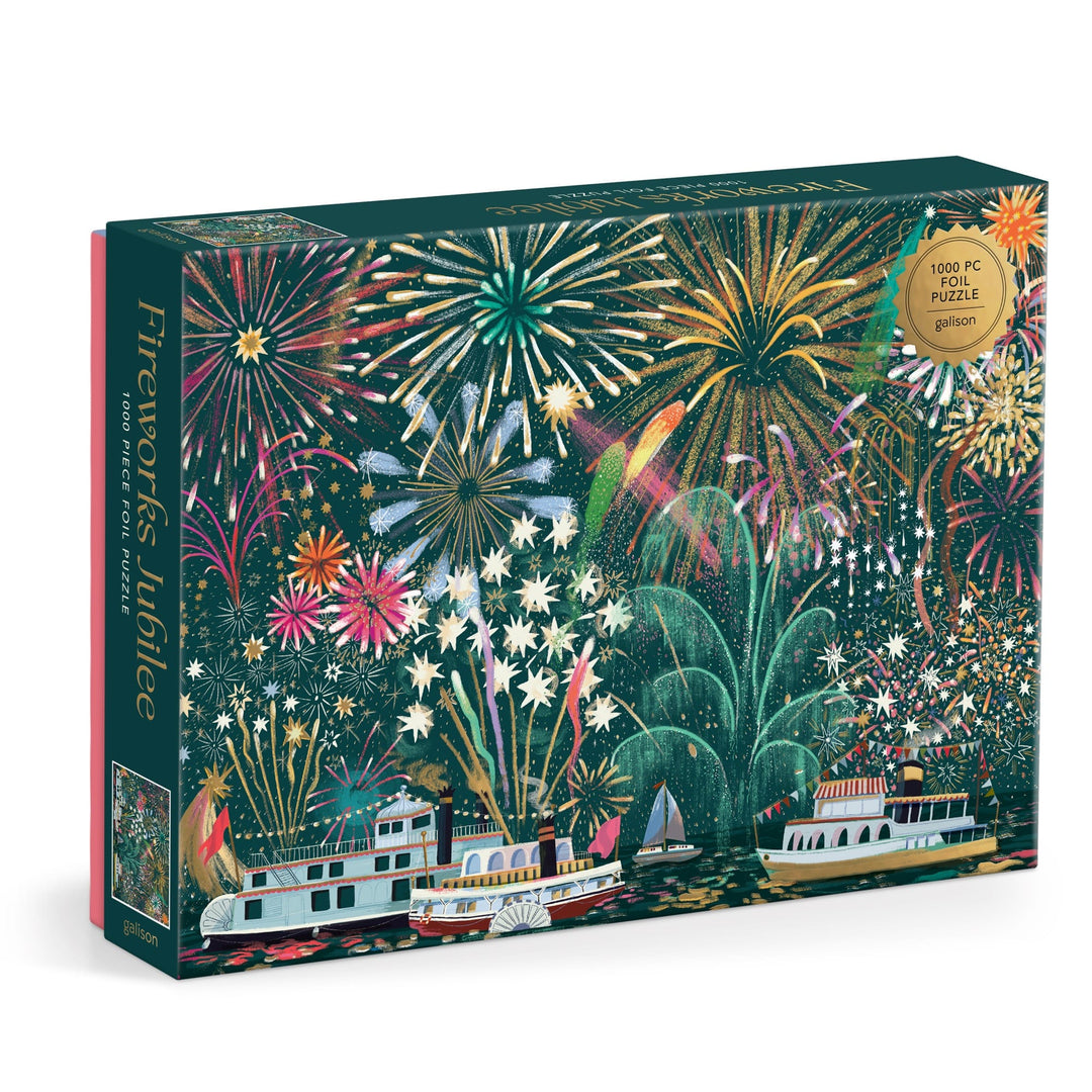 The Sarah Long Fireworks Jubilee 1000 Piece Foil Puzzle features vibrant, festive fireworks above riverboats against a night sky, brought to life with detailed illustrations.