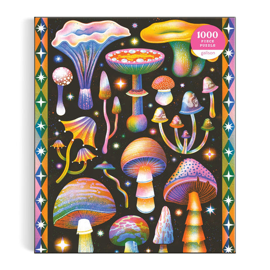 Jasmine Floyd’s Cosmic Mushrooms 1000 Piece Puzzle features whimsical, glowing fungi in vibrant colors on a starry black background—a psychedelic treat for mycology lovers, with “1000 piece puzzle” highlighted in a pink circle.