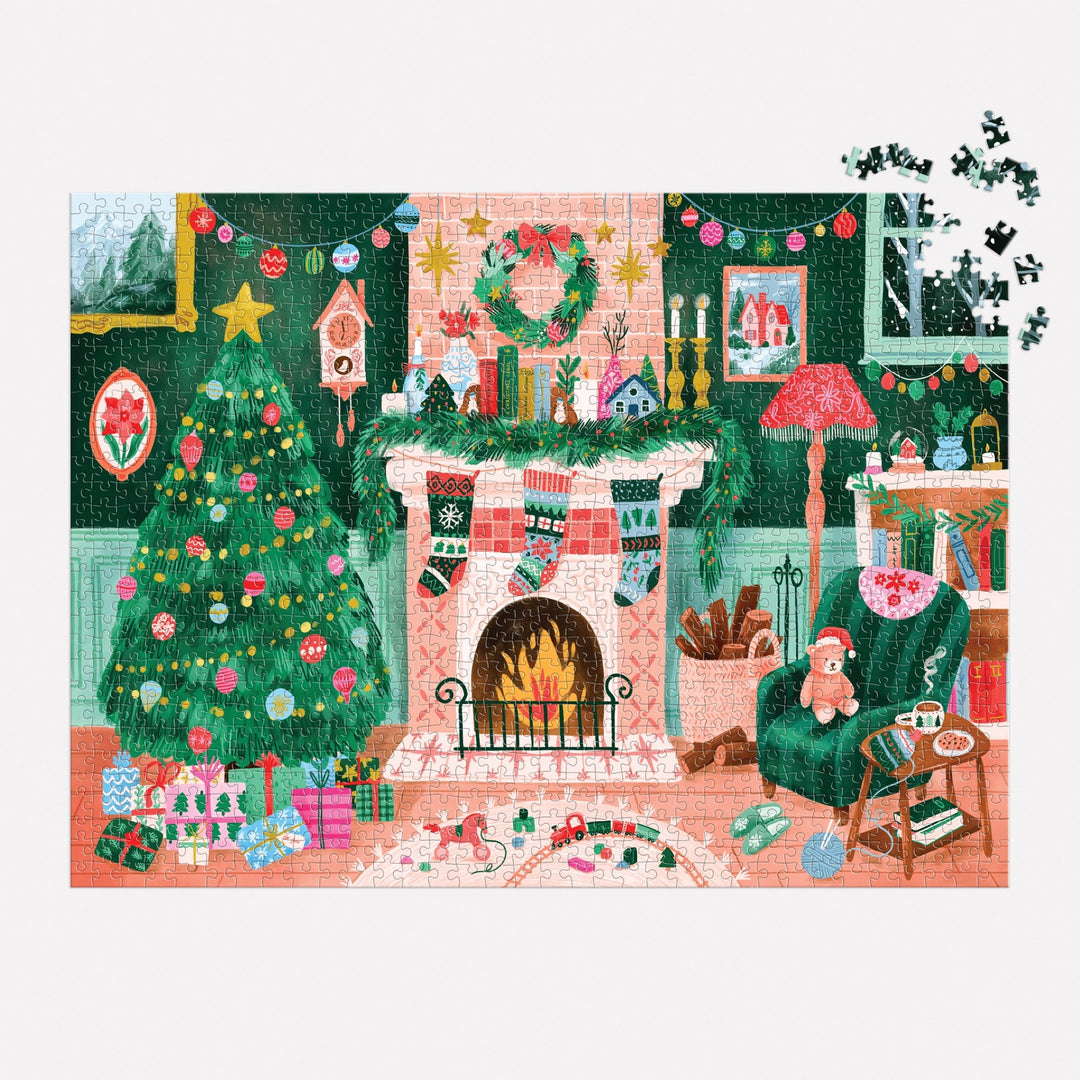 Puzzle lovers will enjoy the Carla Ellis Cozy by the Fireplace 1000 Piece Puzzle, featuring a festive Christmas scene with a decorated tree, stockings, gifts, wreaths, a green armchair, and scattered pieces in the top right corner.