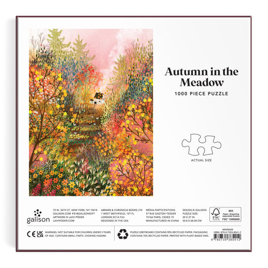 Box for the Autumn in the Meadow 1000 Piece Puzzle by Laivi Põder, featuring vibrant fall foliage, wildflowers, and a white house amid colorful trees in a detailed botanical autumn landscape.