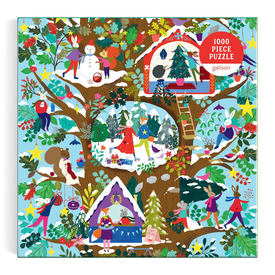 The Deck the Hollows 1000 Piece Puzzle by Flora Waycott features charming animals like rabbits and mice celebrating winter in a decorated tree, surrounded by snow, stars, ornaments, houses, gift-giving, and snowman-building.