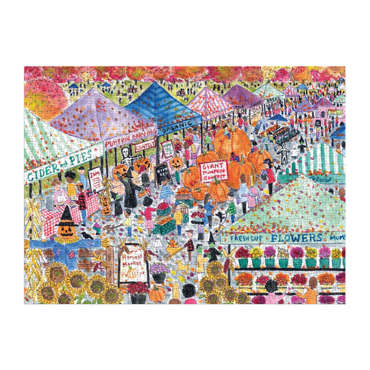 The Michael Storrings Harvest Market 1000 Piece Puzzle by Michael Storrings features a vibrant autumn festival scene with tents selling pies, flowers, organic produce, costumes, pumpkins, festive signs, and fall foliage.