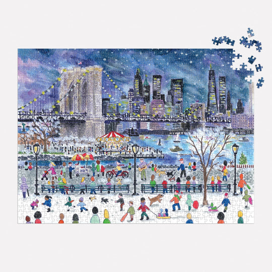 The Michael Storrings Snowfall Over New York City 1000 Piece Puzzle features people ice skating and strolling in a park beneath a starry sky, with a brightly lit NYC skyline and bridge in the background.