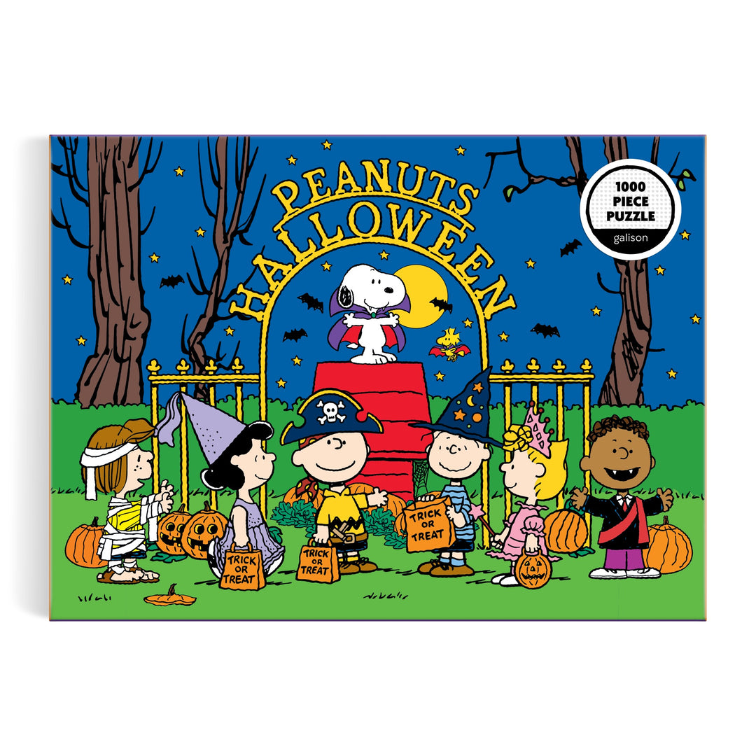 The Peanuts Halloween 1000 Piece Puzzle by Peanuts Worldwide, LLC features Charlie Brown and friends trick-or-treating by a red brick wall at night, with Snoopy as the flying ace atop the wall.