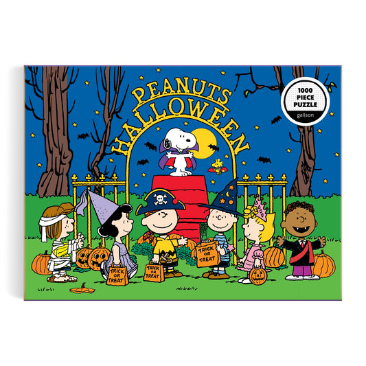The Peanuts Halloween 1000 Piece Puzzle by Peanuts Worldwide, LLC features Charlie Brown and friends trick-or-treating by a red brick wall at night, with Snoopy as the flying ace atop the wall.