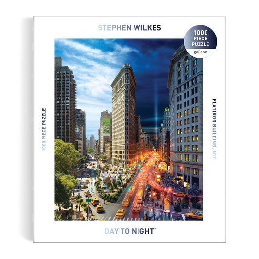 The Stephen Wilkes Day To Night Flatiron 1000 Piece Puzzle by Stephen Wilkes features his iconic photo of NYC’s Flatiron Building transitioning from day on the left to night on the right.