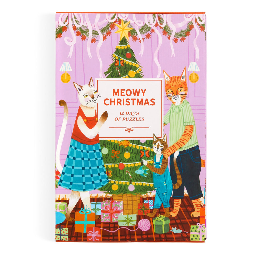 The cover of Meowy Christmas 12 Days of Puzzles 500 Piece Countdown by Joanna Letz shows three cats in festive outfits decorating a tree with gifts, and the title displayed on a sign in front.