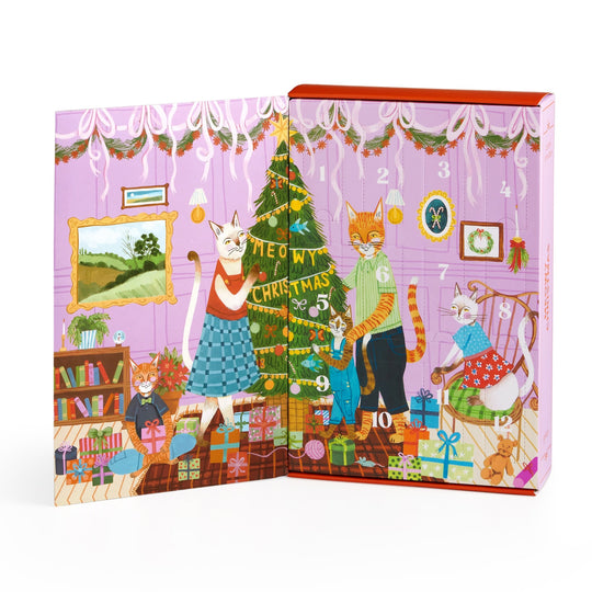 Joanna Letzs Meowy Christmas 12 Days of Puzzles 500 Piece Countdown features four festive cats by a decorated tree with presents in a cozy room. Enjoy the advent calendar scene with numbered doors—perfect for holiday surprises!.