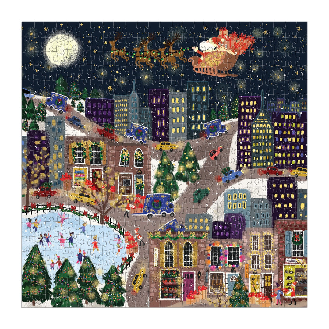 A festive cityscape at night with colorful buildings, an ice skating rink, decorated trees, and Santa in his sleigh fills the Joy Laforme Presentville 500 Piece Foil Puzzle by Joy Laforme—the perfect holiday-themed challenge.