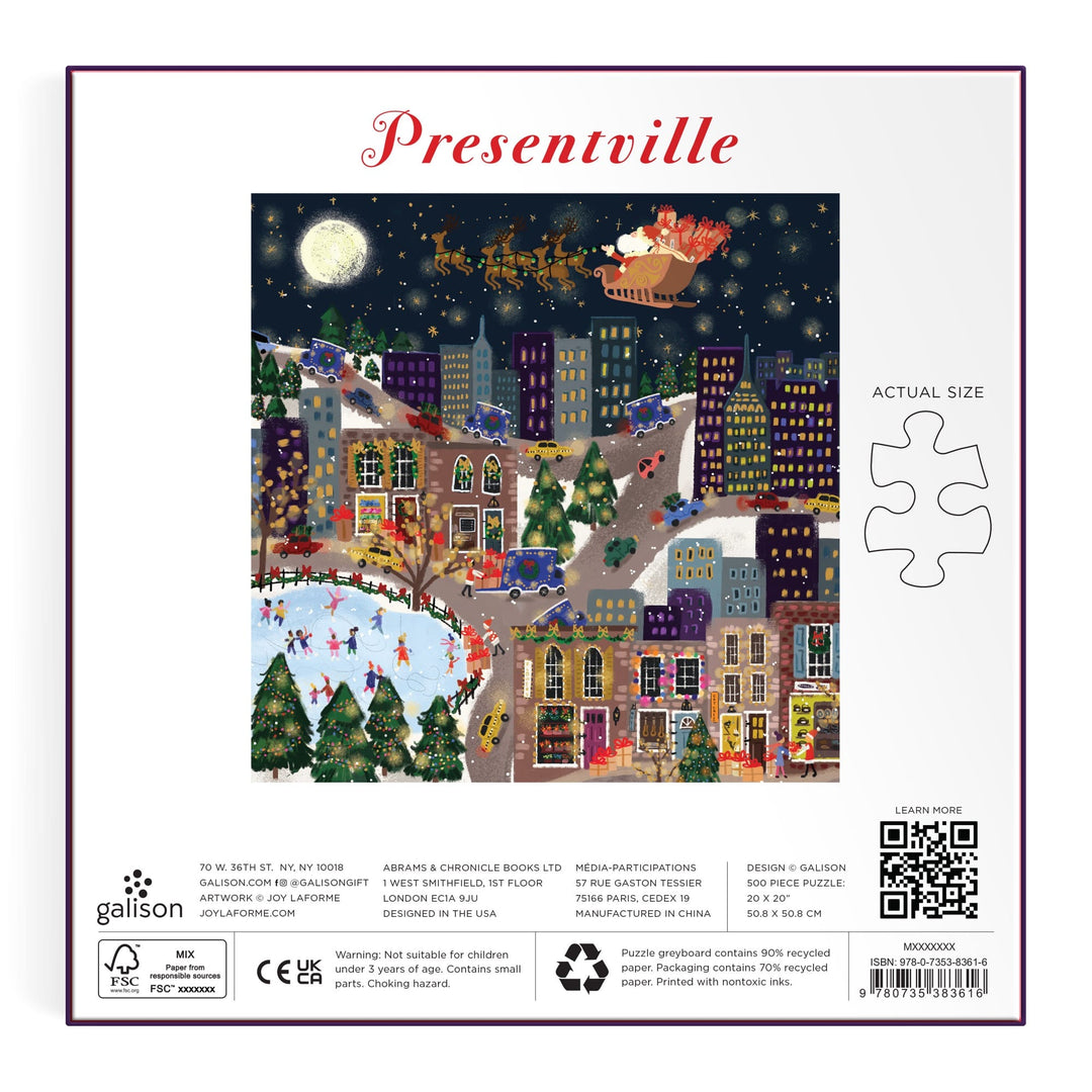 Festive cityscape at night with snow, colorful buildings, ice skaters, and Santa’s sleigh; Joy Laforme Presentville 500 Piece Foil Puzzle packaging features title and puzzle piece outline.