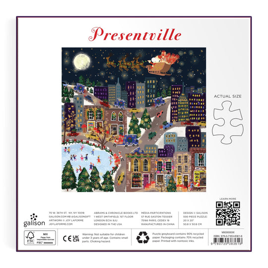 Festive cityscape at night with snow, colorful buildings, ice skaters, and Santa’s sleigh; Joy Laforme Presentville 500 Piece Foil Puzzle packaging features title and puzzle piece outline.