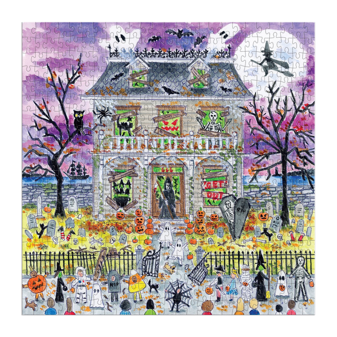The Michael Storrings Haunted House 500 Piece Glow in the Dark Puzzle by Michael Storrings features skeletons, jack-o’-lanterns, bats, tombstones, trick-or-treaters, and a witch flying past the moon—perfect for intermediate puzzlers!.