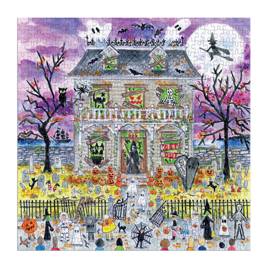 The Michael Storrings Haunted House 500 Piece Glow in the Dark Puzzle by Michael Storrings features skeletons, jack-o’-lanterns, bats, tombstones, trick-or-treaters, and a witch flying past the moon—perfect for intermediate puzzlers!.