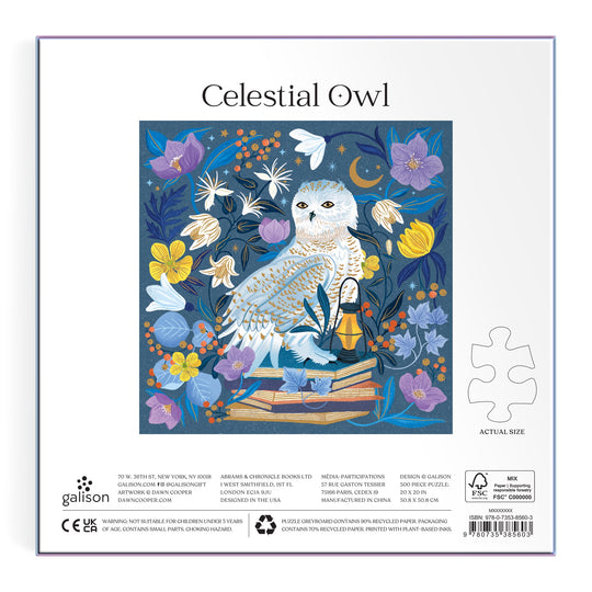 A white owl sits on books among vibrant flowers and leaves on a dark background. Celestial Owl 500 Piece Foil Puzzle by Dawn Cooper is featured above, with premium foil puzzle piece and company details below.