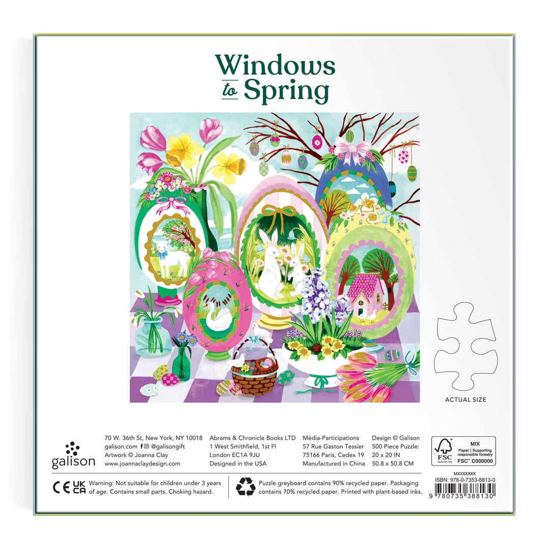Colorful spring-themed eggs, flowers, a nest, a basket of eggs, and a purple house with greenery appear on the back of Joanna Clay’s Windows to Spring 500 Foil Piece Puzzle box.