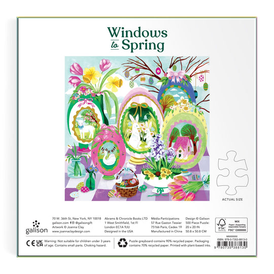 Colorful spring-themed eggs, flowers, a nest, a basket of eggs, and a purple house with greenery appear on the back of Joanna Clay’s Windows to Spring 500 Foil Piece Puzzle box.