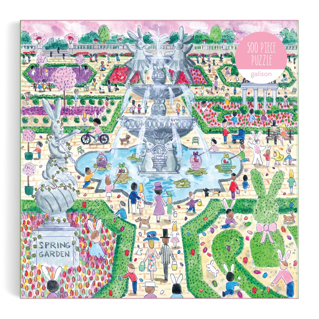 Colorful illustration of a lively garden with people and animals among flowers, fountains, and topiary statues decorates the cover of the Michael Storrings Spring Egg Hunt 500 Piece Puzzle by Michael Storrings.