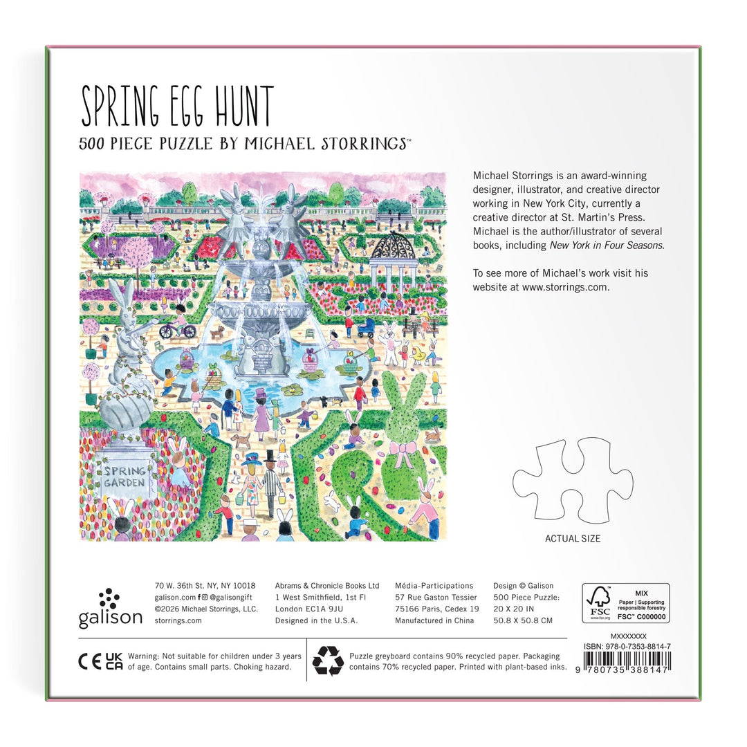 The back of the Michael Storrings Spring Egg Hunt 500 Piece Puzzle box shows a vibrant spring egg hunt garden scene, info about the puzzle and artist Michael Storrings, plus a sample piece to display actual size.