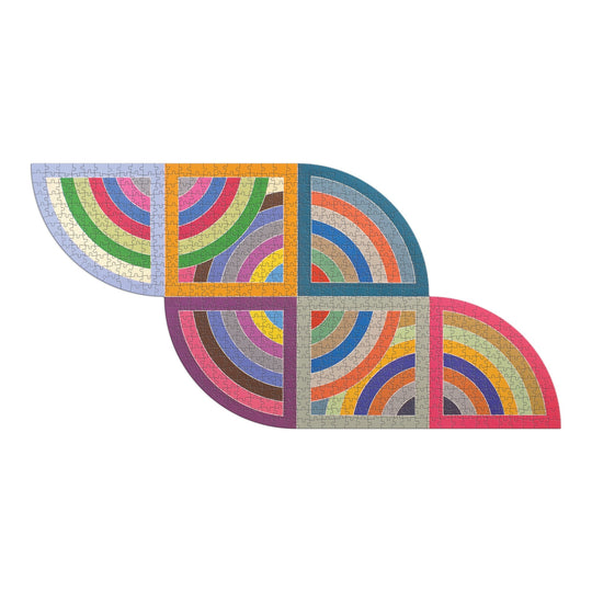 The Frank Stella Harran II 750 Piece Shaped Puzzle by Frank Stella features eight sections of colorful, overlapping arcs and geometric shapes that create a symmetrical, abstract pattern on a white background. Comes in a stylish drawer box.