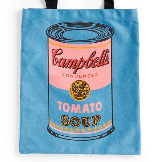 The Andy Warhol Foundation For The Visual Arts' Warhol Soup Can Volume 3 Canvas Tote Bag features a blue design with a large, colorful Campbell’s tomato soup can graphic and black handles.