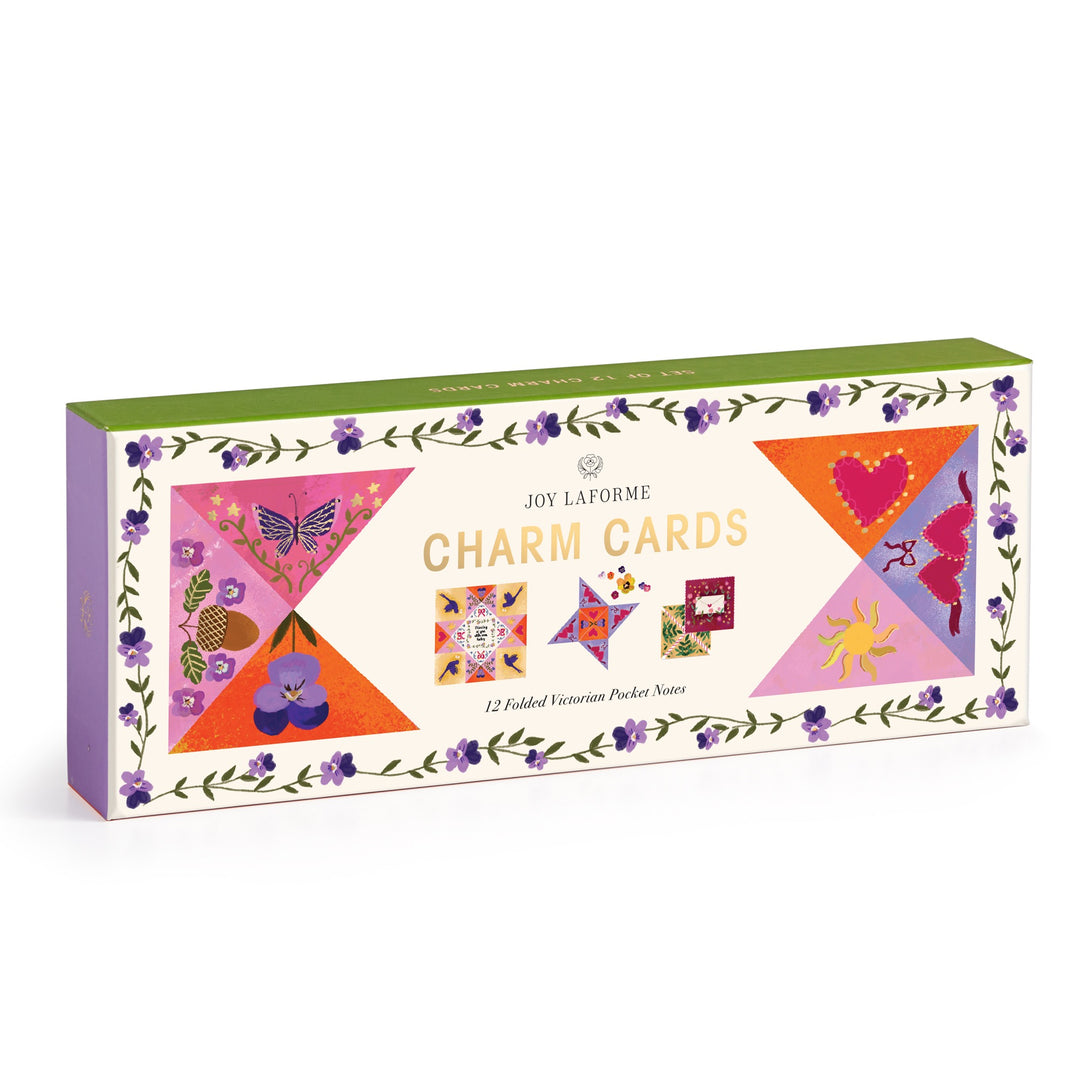 The Joy Laforme Charm Cards by Joy Laforme feature quilt-like patterns and floral borders. This elegant stationery set includes 12 folded notecards adorned with butterflies, hearts, a cat, sun, and flowers for stylish correspondence.
