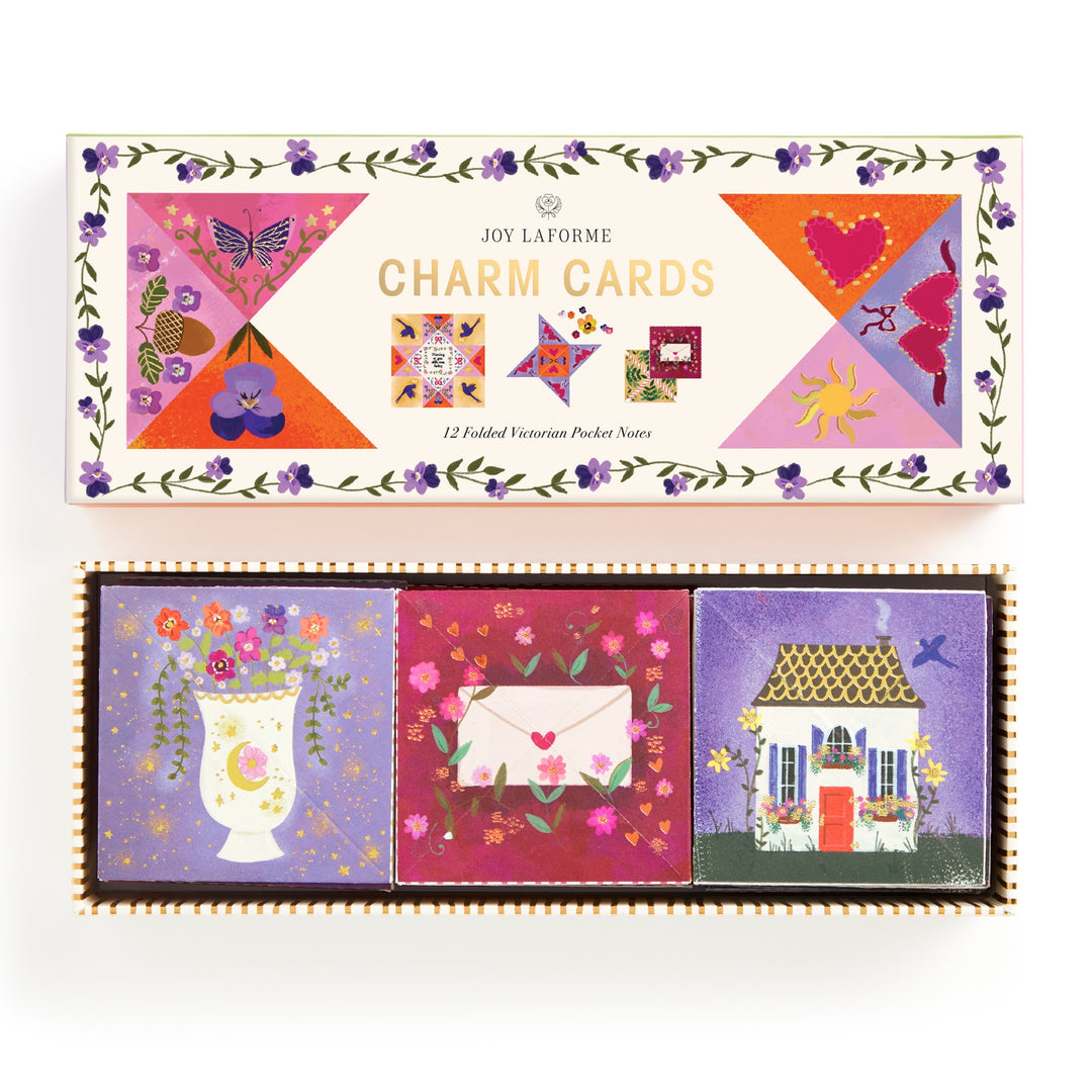 The Joy Laforme Charm Cards by Joy Laforme feature colorful illustrations—a butterfly, flower, heart, sun, and quilt blocks—and include three notecards: a flower vase, an envelope with hearts, and a house with a red door.