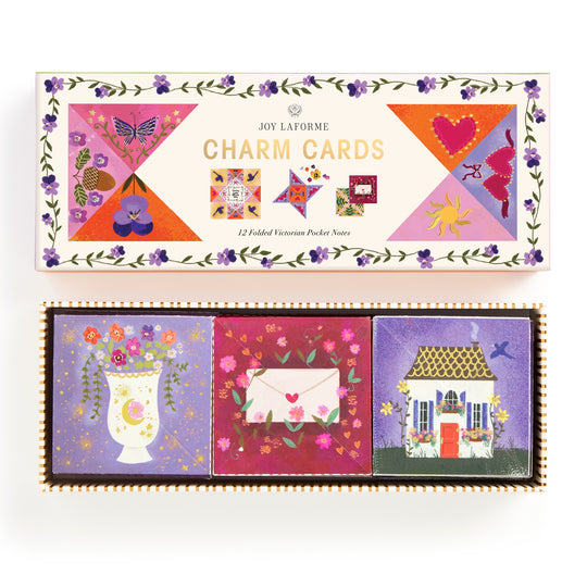 The Joy Laforme Charm Cards by Joy Laforme feature colorful illustrations—a butterfly, flower, heart, sun, and quilt blocks—and include three notecards: a flower vase, an envelope with hearts, and a house with a red door.