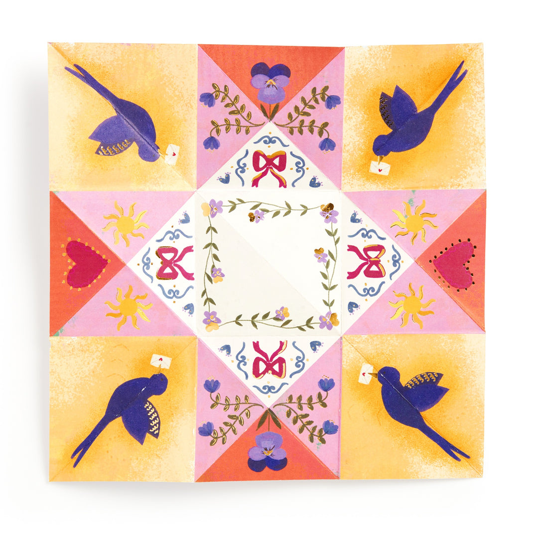 The Joy Laforme Charm Cards by Joy Laforme feature vibrant floral patterns, red hearts, and four blue birds with envelopes, symmetrically arranged around a blank diamond—elegant stationery for any occasion.