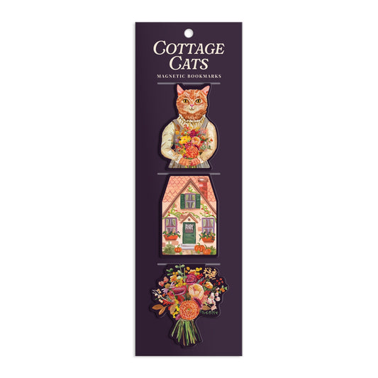 The Cottage Cats Magnetic Bookmarks by Anja Riebensahm features three magnetic bookmarks on a dark backing: a cat with flowers, a cottage house, and a colorful flower bouquet.