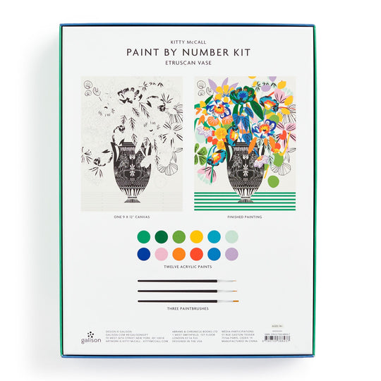 The back of the Kitty McCall Etruscan Vase 9 x 12" Paint by Number Kit box displays a black-and-white canvas, a finished example, twelve acrylic paints, three paintbrushes, and kit details from the Kitty McCall brand.