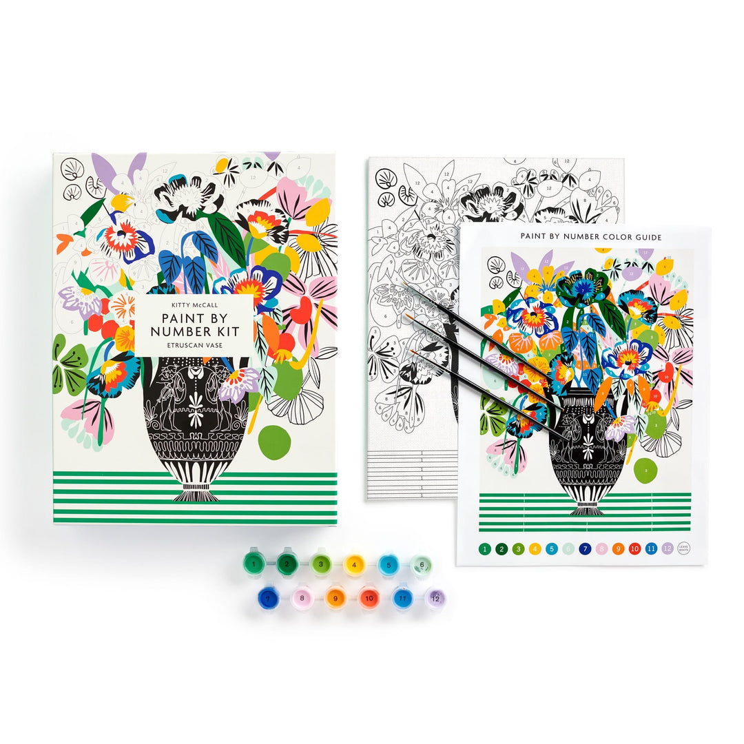 The Kitty McCall Etruscan Vase 9 x 12" Paint by Number Kit features a floral vase design and includes a box, color guide, outlined canvas, three paintbrushes, and twelve assorted paint pots.