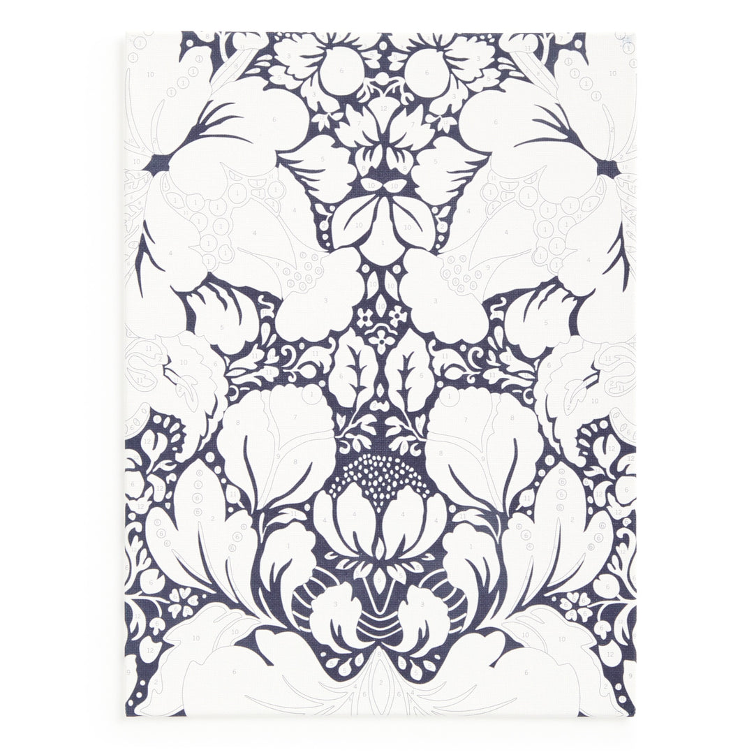 The Liberty London 9 x 12 Paint by Number Kit Glastonbury features a detailed black and white floral design with symmetrical, stylized flowers and leaves, inspired by classic Glastonbury patterns for a decorative, premium look.