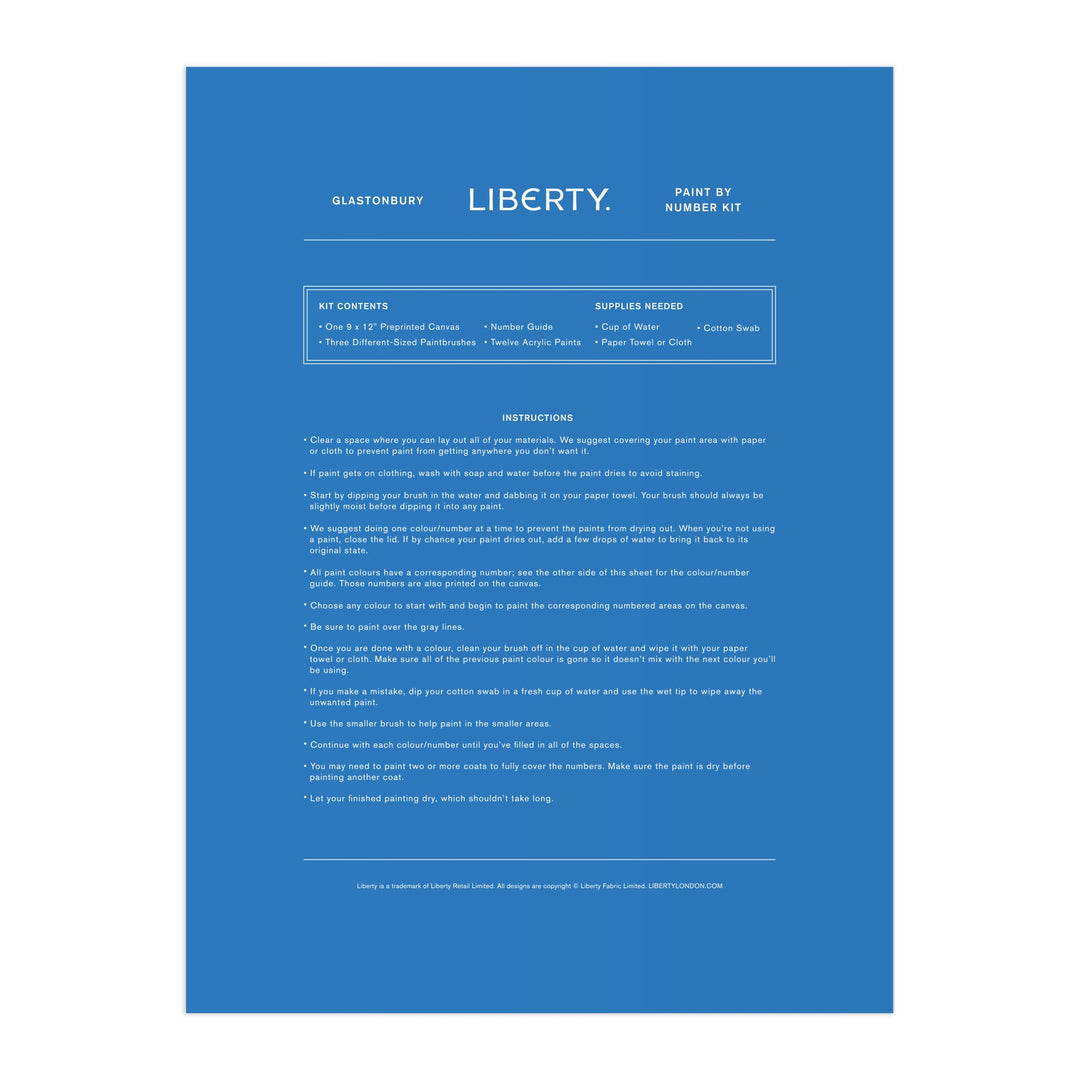 A blue instruction sheet for the Liberty London Liberty 9 x 12 Paint by Number Kit Glastonbury features centered white text with step-by-step instructions, kit contents, and needed supplies, including premium acrylic paints.