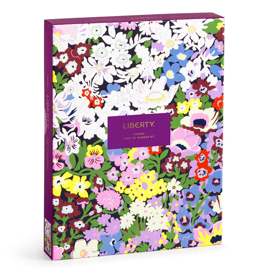 A colorful box with a purple border displays Liberty 9 x 12 Paint by Number Kit Thorpe by Liberty London in gold lettering, featuring vibrant floral designs inspired by the Thorpe pattern.