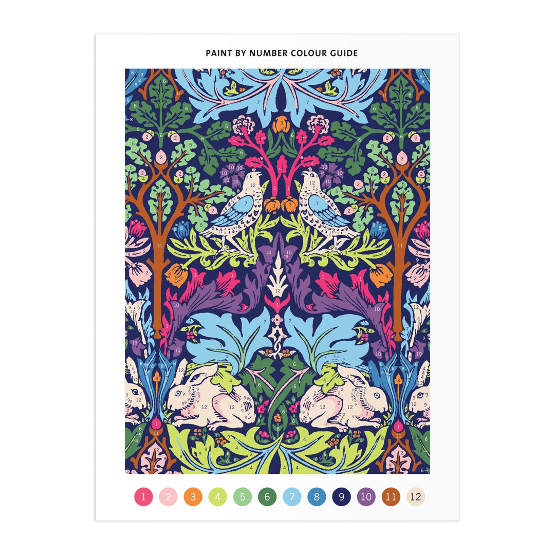 The William Morris Brother Rabbit 9 x 12" Paint by Number Kit features an intricate floral design with two birds, two rabbits, and various leaves and flowers. Numbered color circles are displayed along the bottom for easy painting.